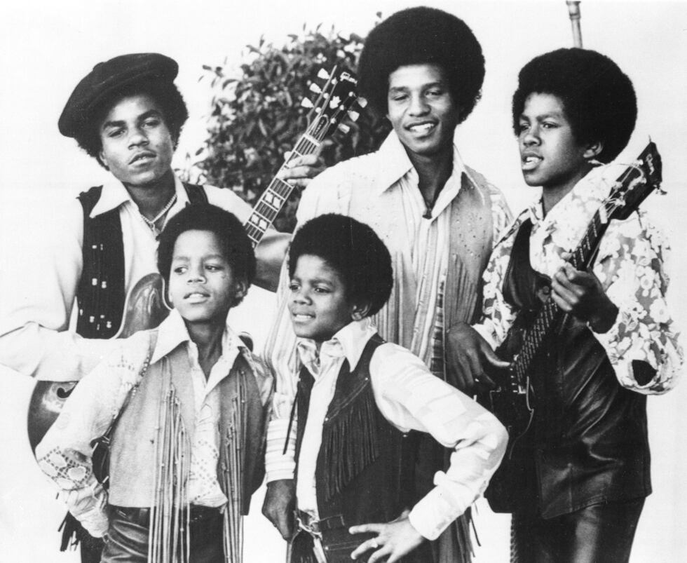 FILE - The Jackson 5, Michael Jackson, front right; Marlon Jackson, front left; Tito Jackson,...